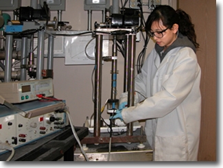 Slow strain rate rigs for stress corrosion cracking